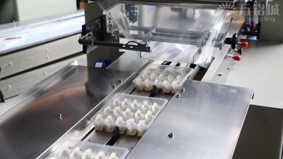 Flow packaging machine